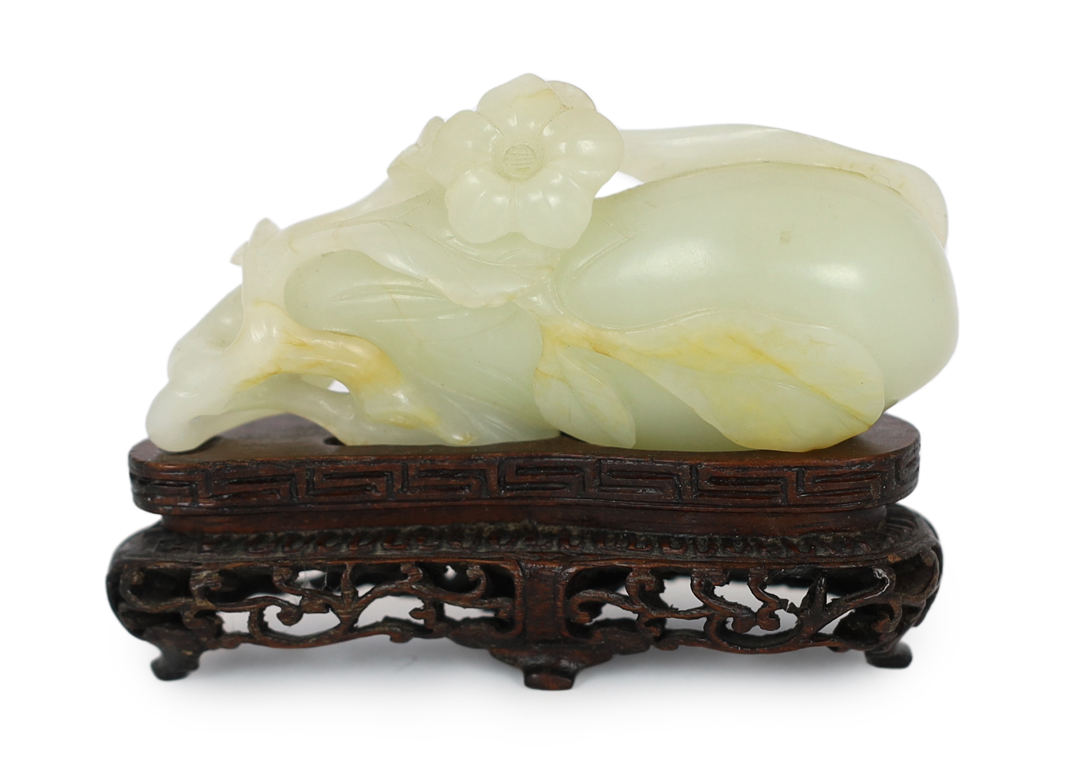 A Chinese pale celadon jade carving of a fruit, 18th century